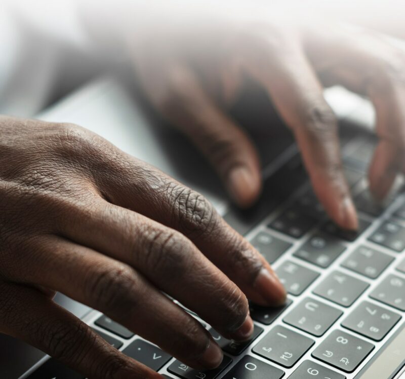 woman-typing-laptop-keyboard_53876-97123