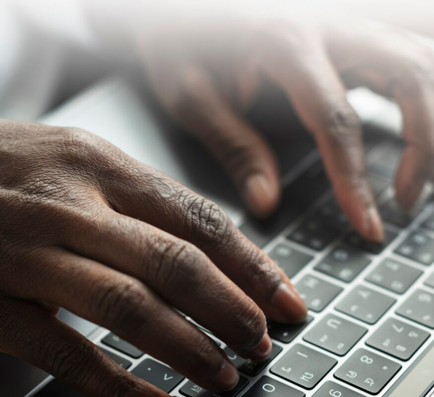 woman-typing-laptop-keyboard_53876-97123